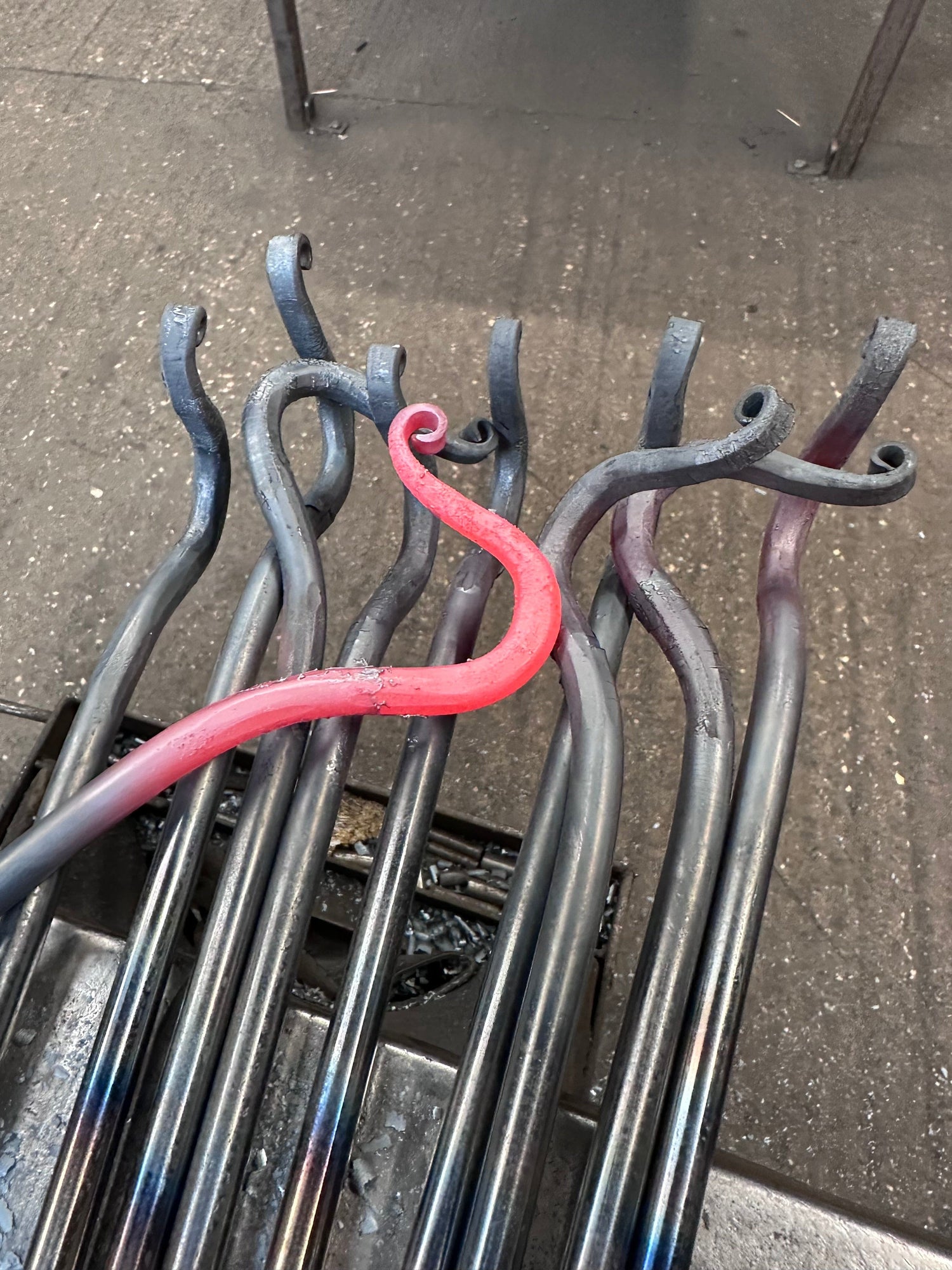 Forged hook arm