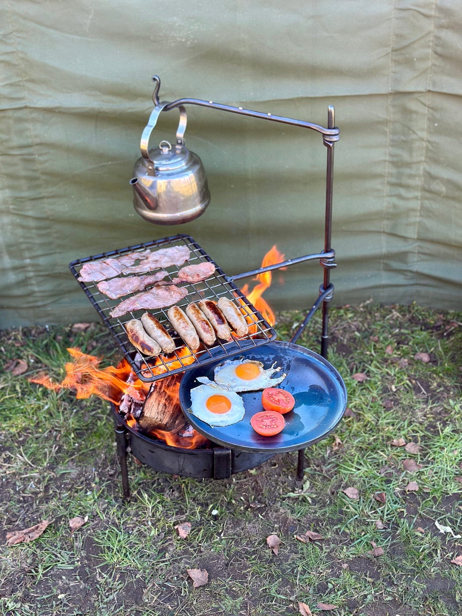 fire anchor cook swing arm. Is a portable bbq cooking setup.